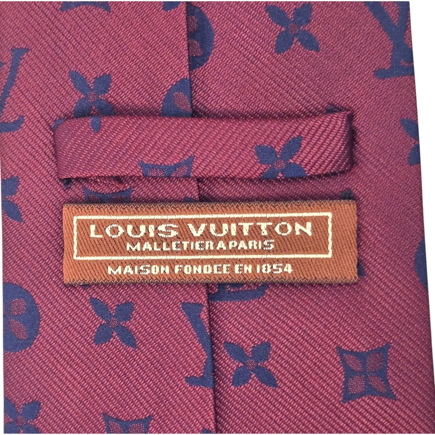TWO DESIGNER SILK NECK TIES: HERMES AND LOUIS VUITTON