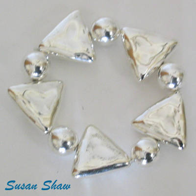 SUSAN SHAW STERLING SILVER PLATED STRETCH BRACELET